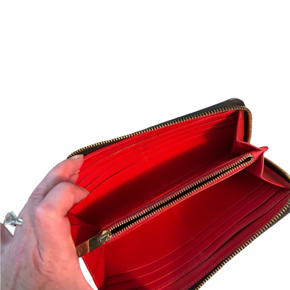 Christian Louboutin Panettone Black Studded Zip Wallet
Gold studs, red inside - Picture 5 of 7